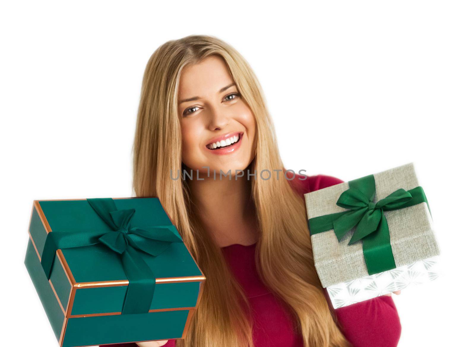 Christmas gifts and holiday presents, happy woman holding gift boxes isolated on white background, portrait