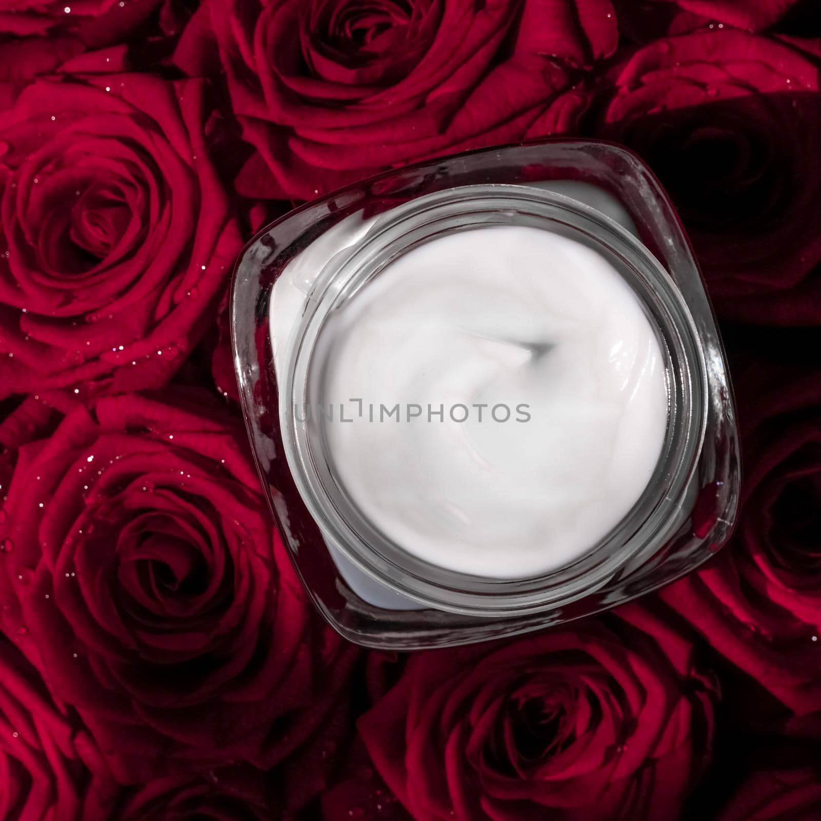 Face cream skin moisturizer and red roses flowers, luxury skincare cosmetic product on floral background as beauty brand holiday flatlay design by Anneleven