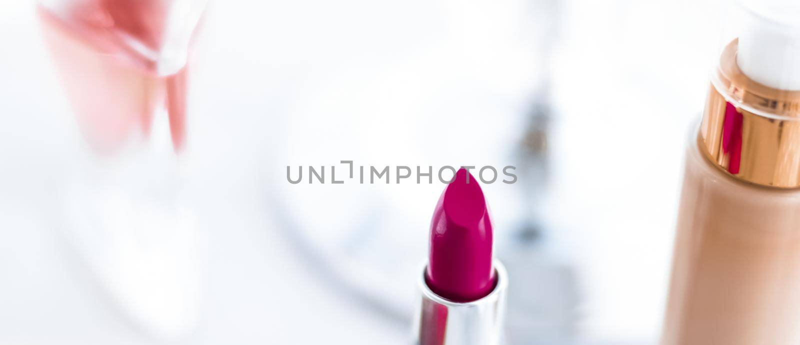 Cosmetic branding, girly and glamour concept - Cosmetics, makeup products on dressing vanity table, lipstick, foundation base, nailpolish and eyeshadows for luxury beauty and fashion brand ads design