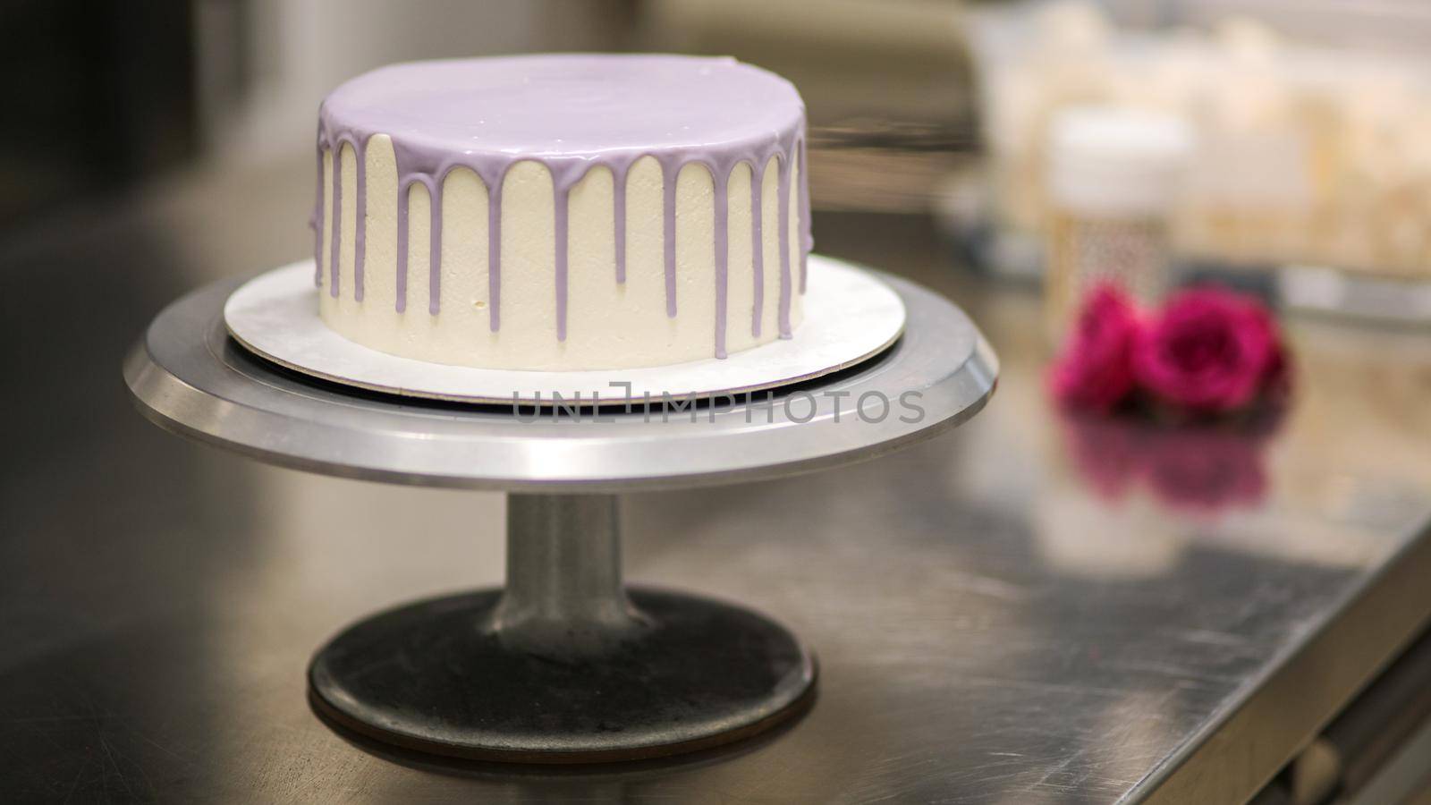 white cake without decor on a stand