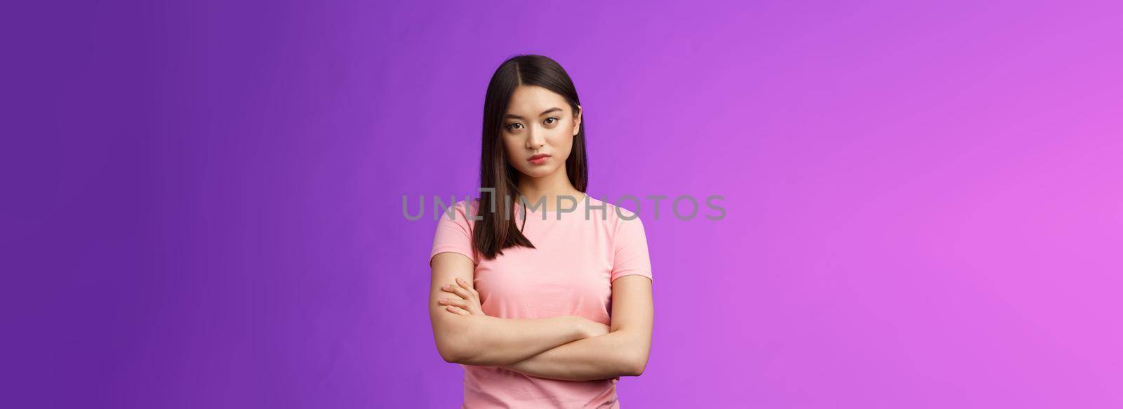 Bothered and pissed asian woman brunette, cross arms chest block, feeling offended annoyed, stare dismay disappointment, stand purple background upset irritated, fed up listen excuses.