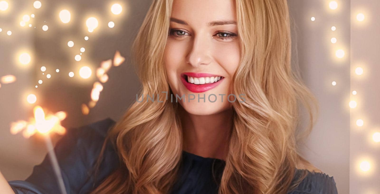 Holiday magic, Christmas and New Year celebration, happy woman with sparklers, portrait