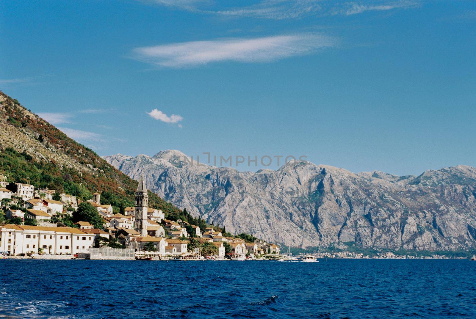 Coast of Perast against the backdrop of mountains. Montenegro High quality photo