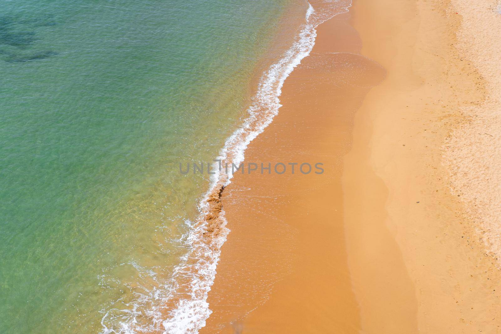 Aerial view of sea waves and sandy beach Atlantic ocean seashore
