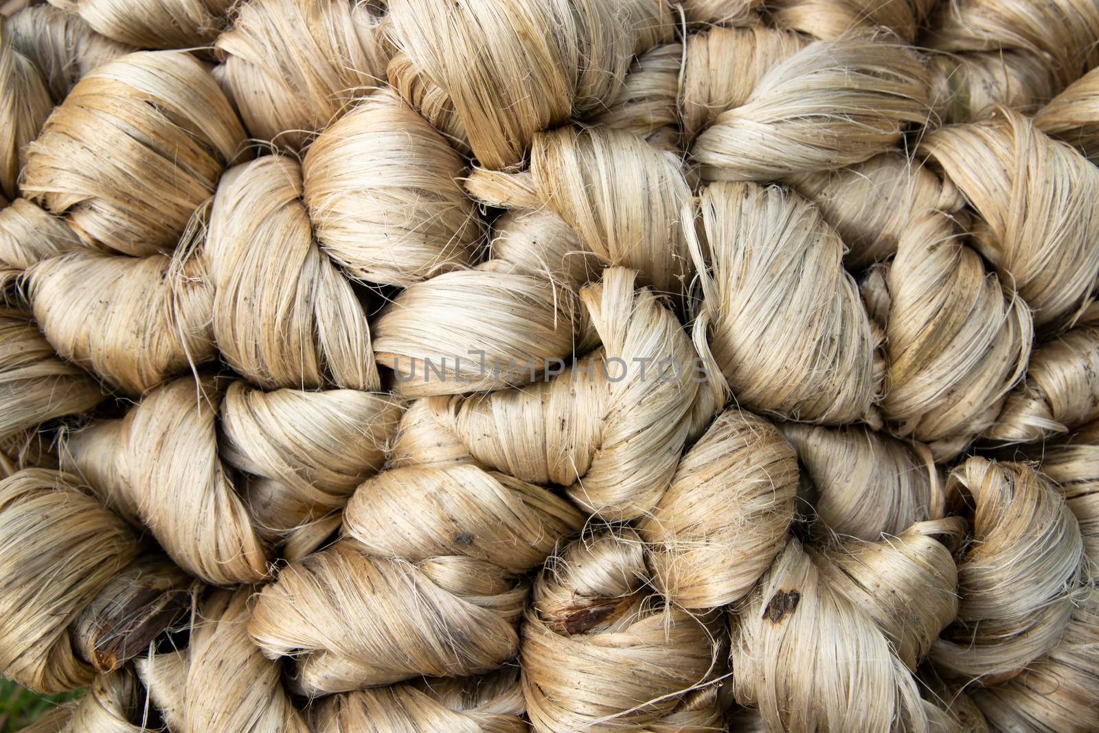 thick brown bundle of raw jute fiber Texture Background