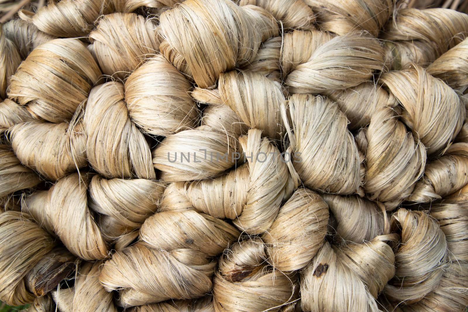 thick brown bundle of raw jute fiber Texture Background