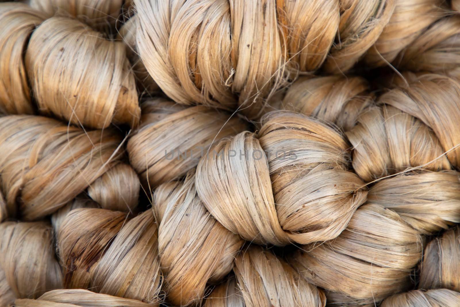 thick brown bundle of raw jute fiber Texture Background