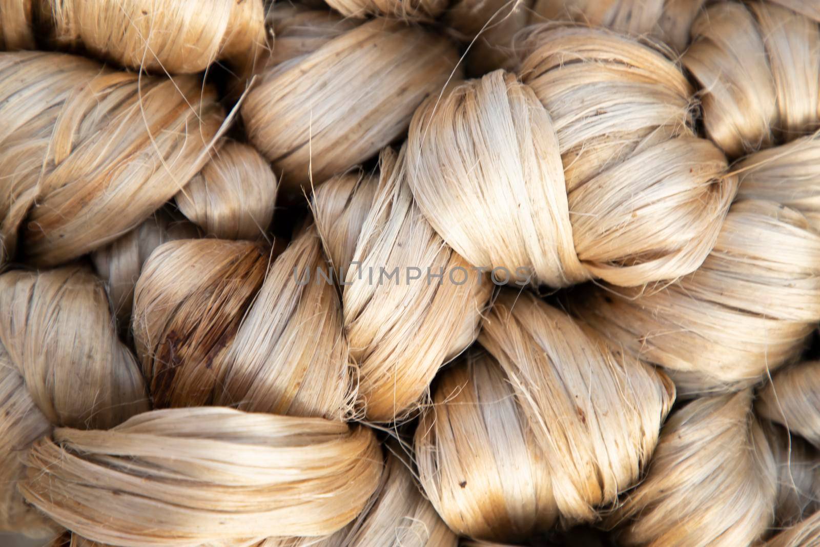 thick brown bundle of raw jute fiber Texture Background