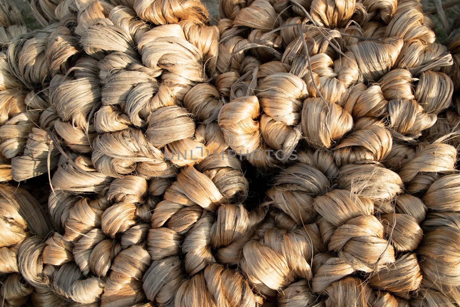thick brown bundle of raw jute fiber Texture Background