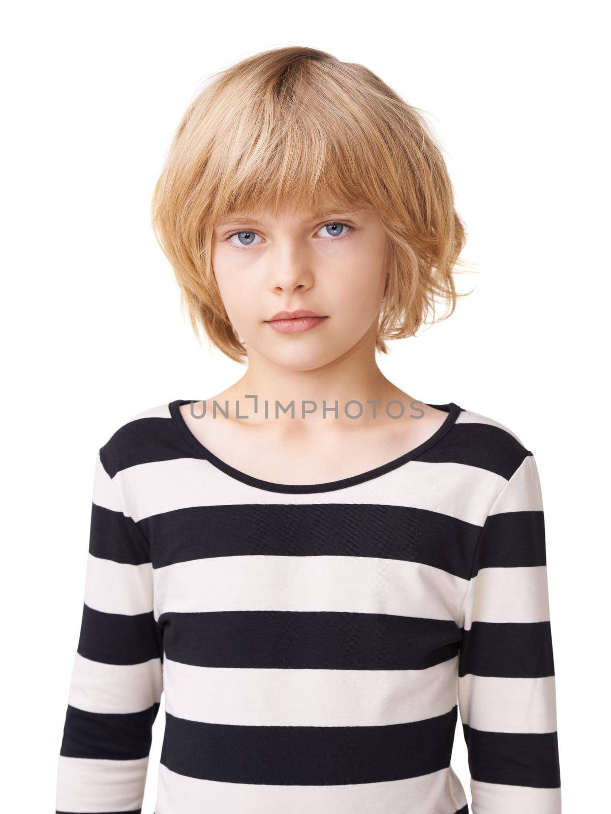 Portait perfection. Portrait of a pretty little girl standing against a white background