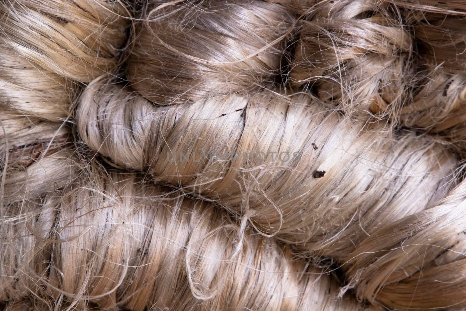 A thick bundle of Golden jute fiber Texture Background