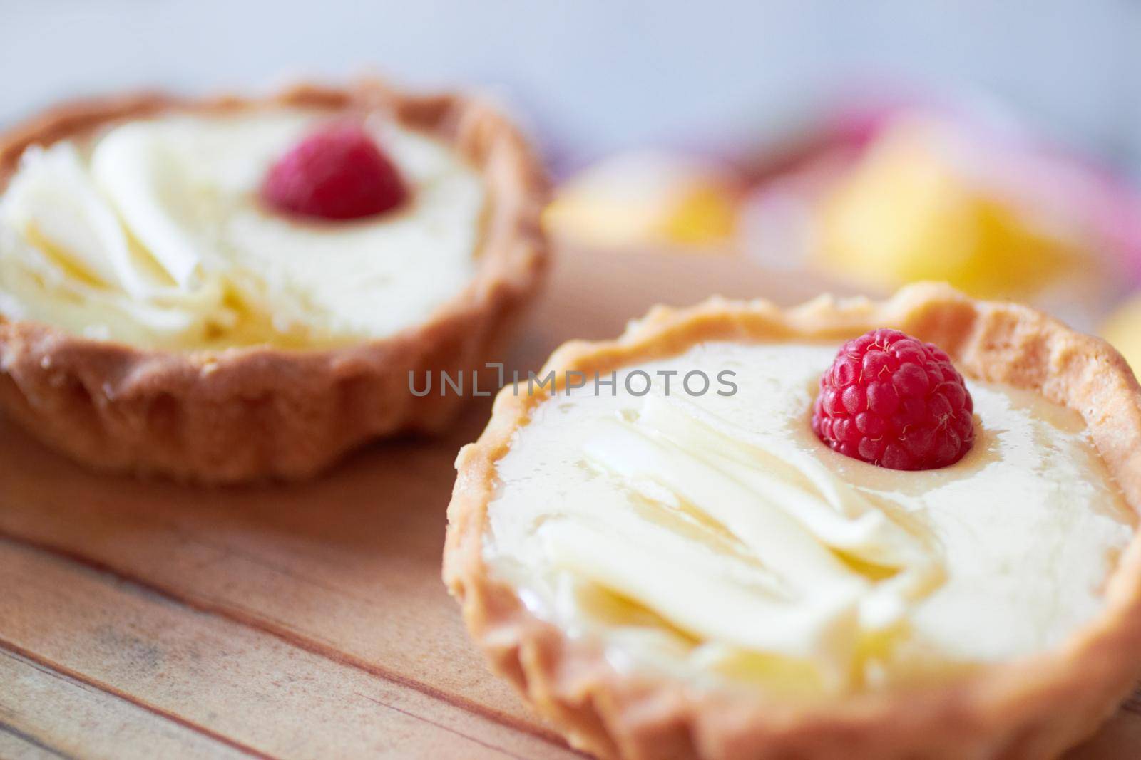 For those with a sweet tooth. two delicious mini tarts. by YuriArcurs