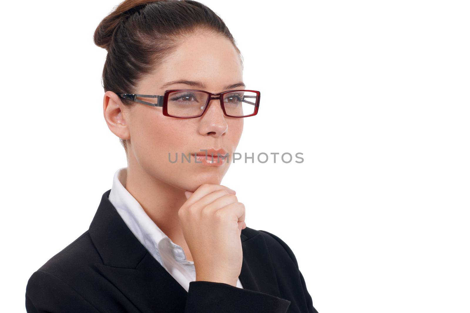 Shes worked her way to the top. Studio shot of a confident-looking young business woman isolated on white. by YuriArcurs