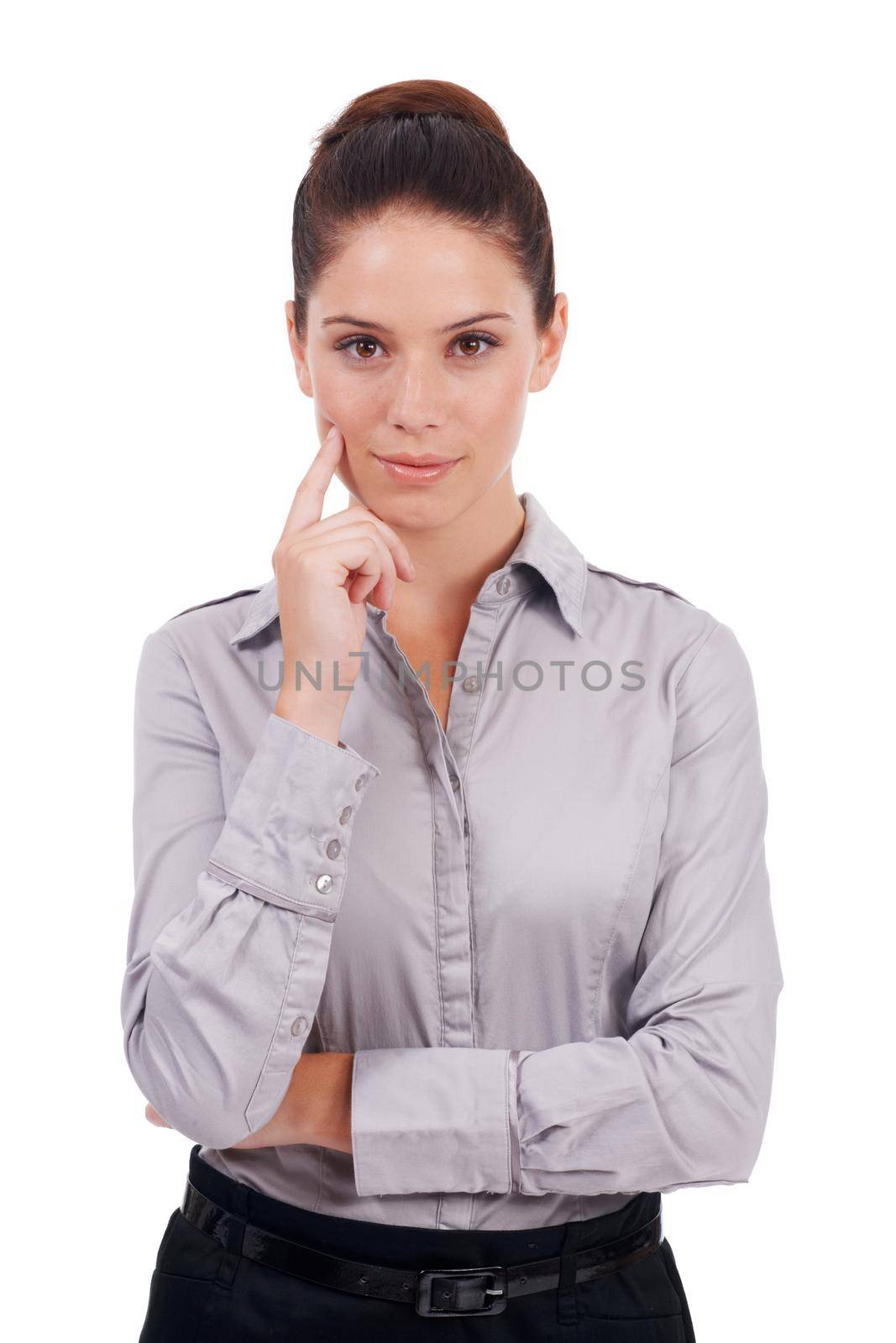Thinking of her next move up the corporate ladder. Studio portrait of a young business woman with her hand on her chin isolated on white