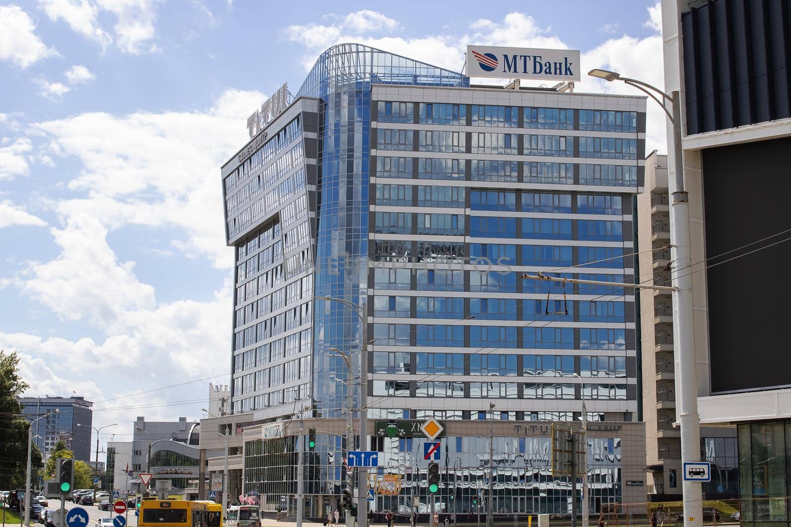 Belarus, Minsk - 01 august, 2022: Glass building by a large road close up