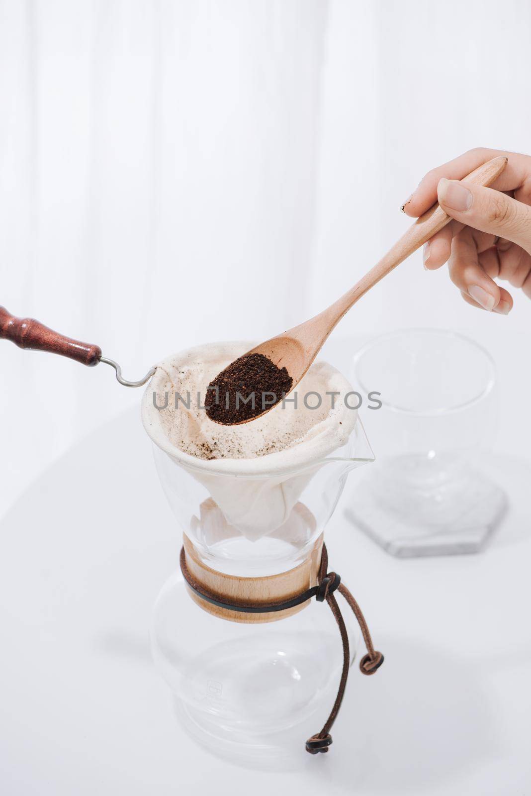 Man spills coffee powder to Drip Coffee