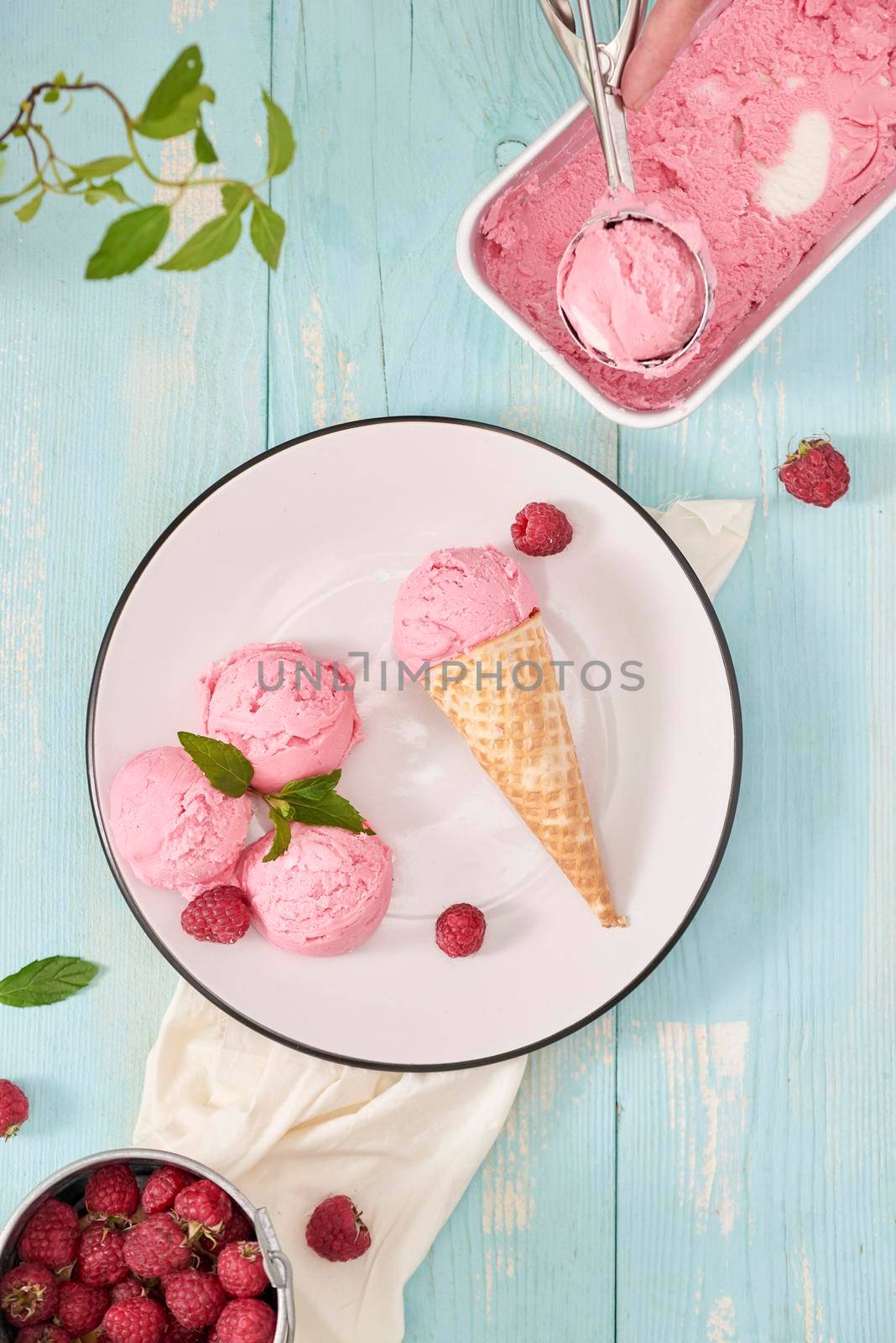 Delicious ice cream cone on a dish by makidotvn