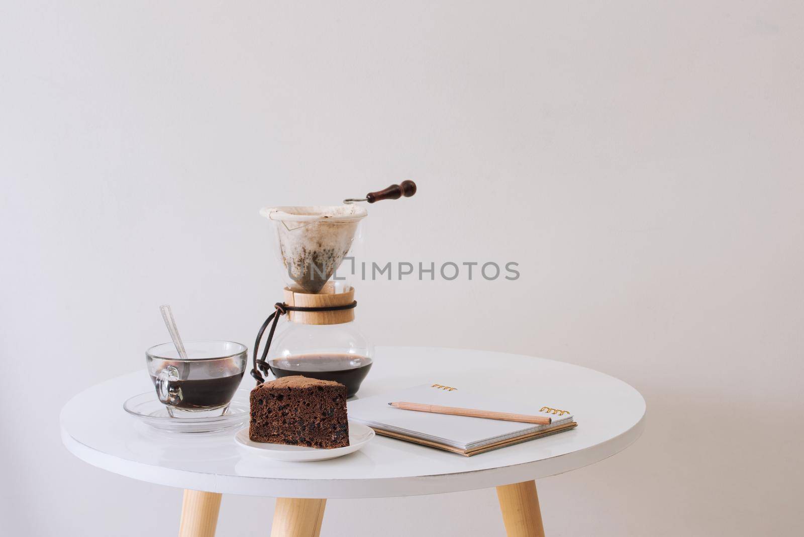 Breakfast with chocolate cake and coffee served on a beautiful living home  by makidotvn