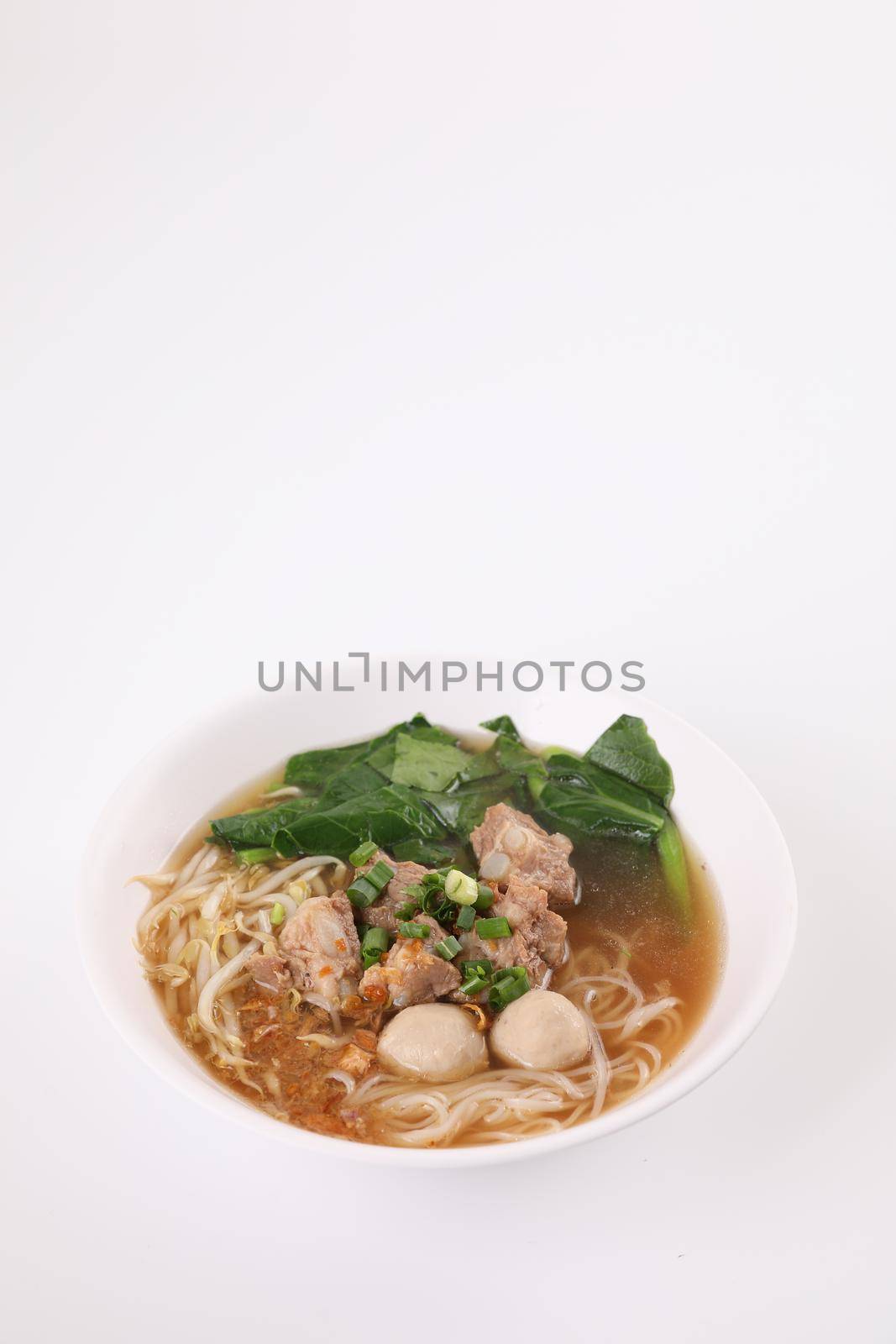 Local Thai food , Noodle with meat ball and pork isolated in white background