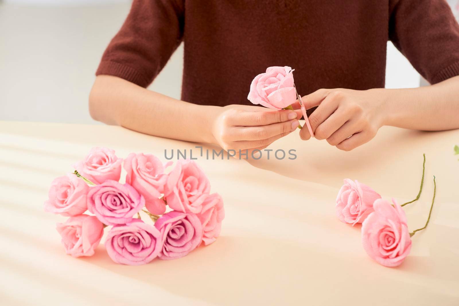 People making paper craft flower art 