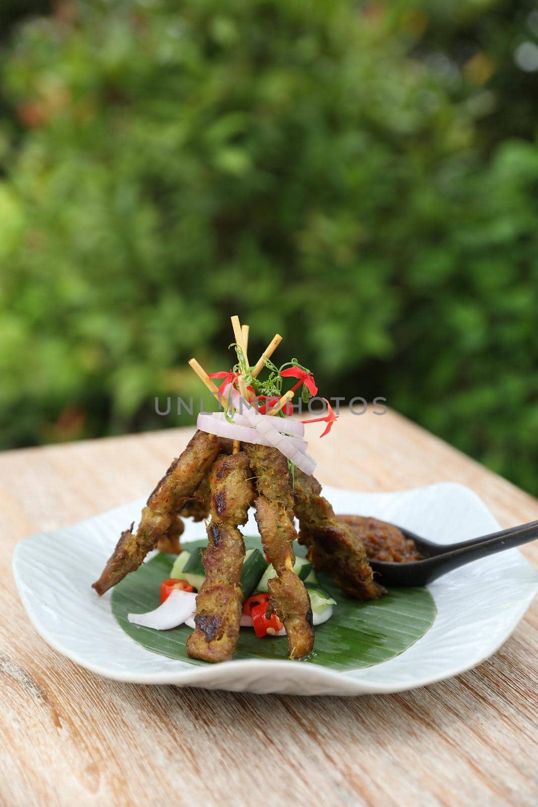 Chicken Satay on dark brown table street food appetizer