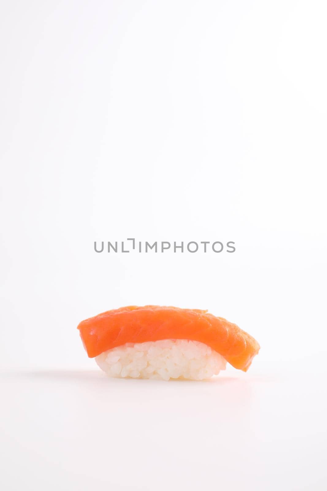 Salmon sushi Japanese food isolated in white background by piyato