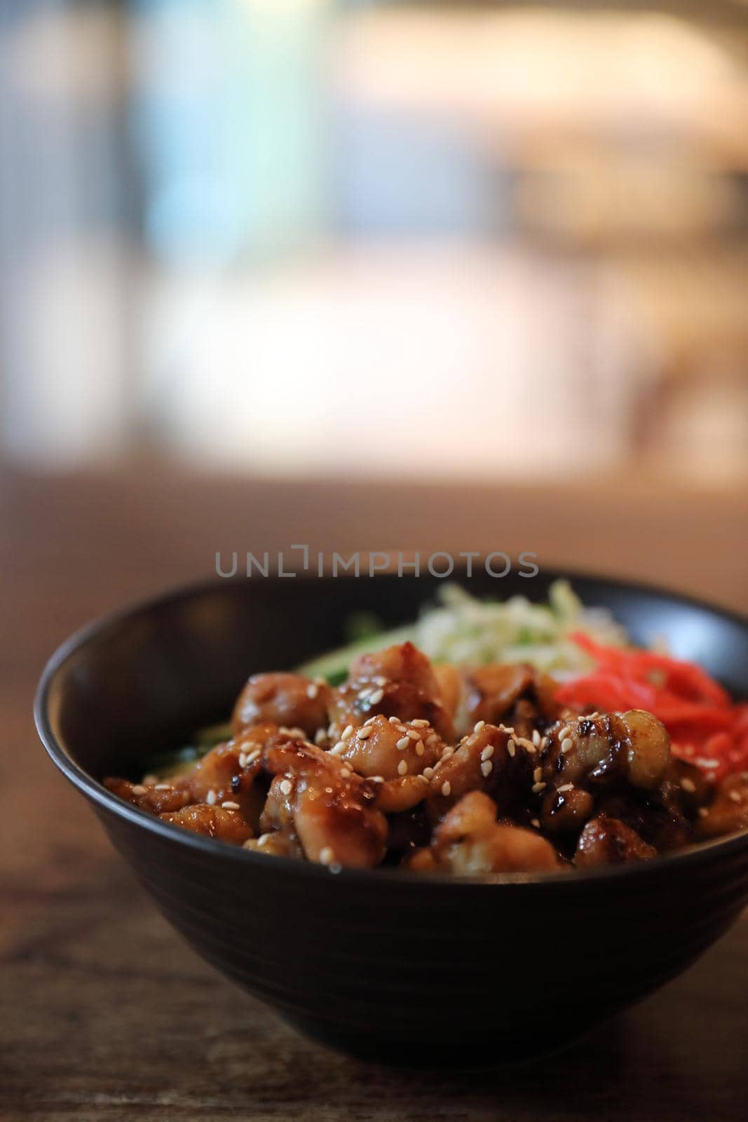 japanese food Chicken teriyaki with rice on wood background by piyato