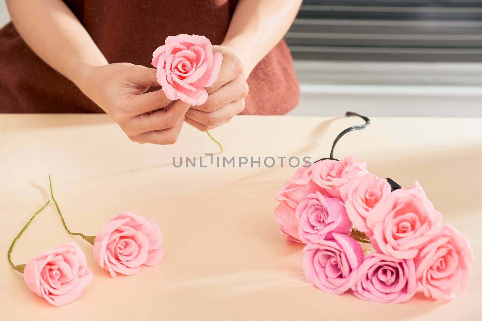 People making paper craft flower art 