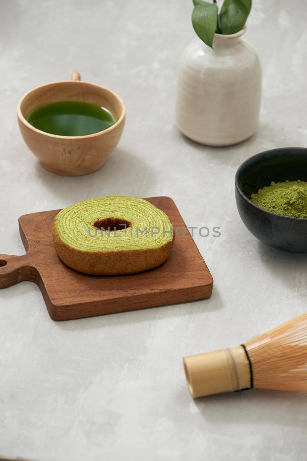 German cake, Green tea Baumkuchen with latte by makidotvn