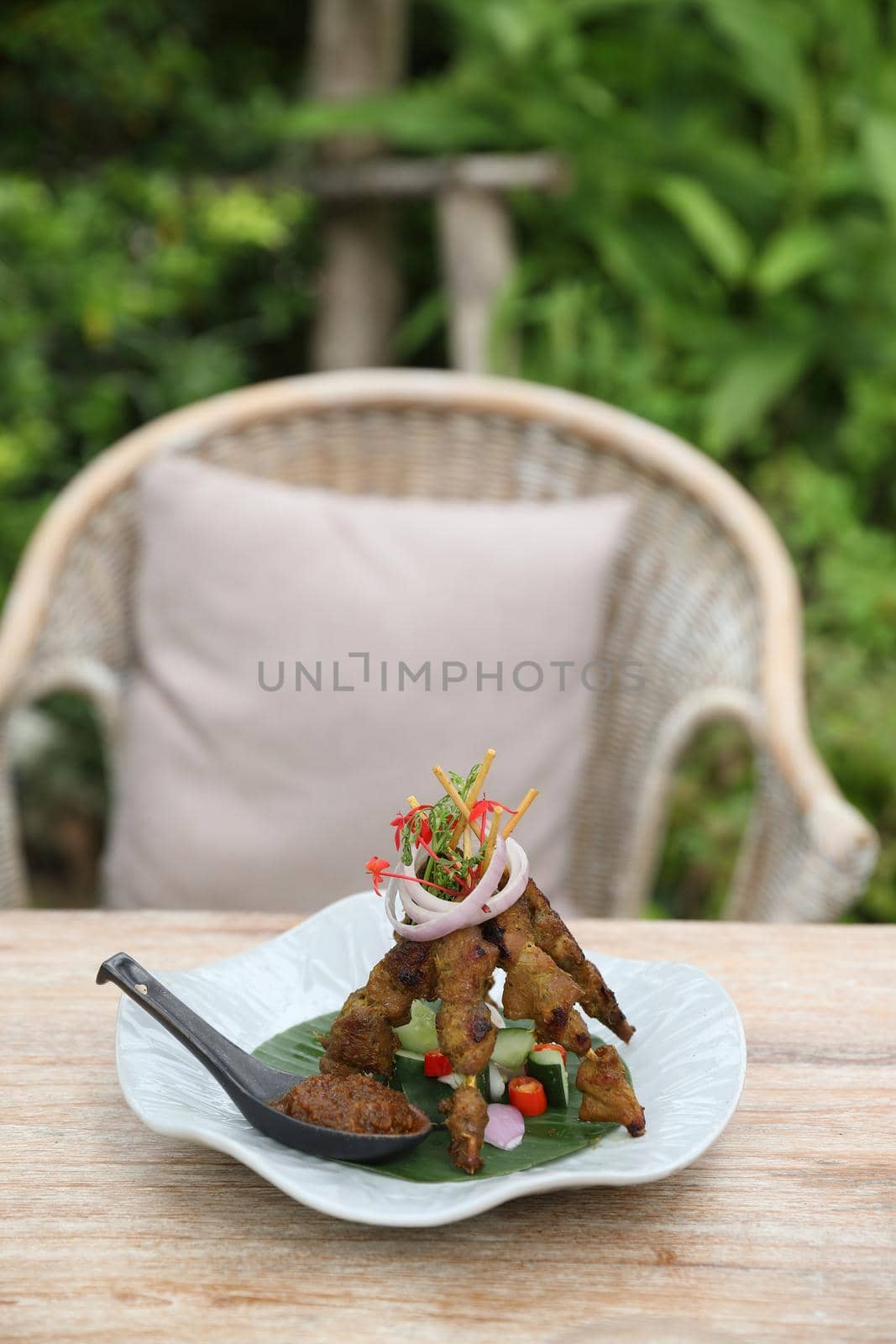 Chicken Satay on dark brown table street food appetizer