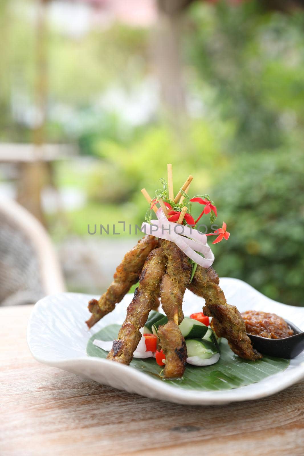 Chicken Satay on dark brown table street food appetizer