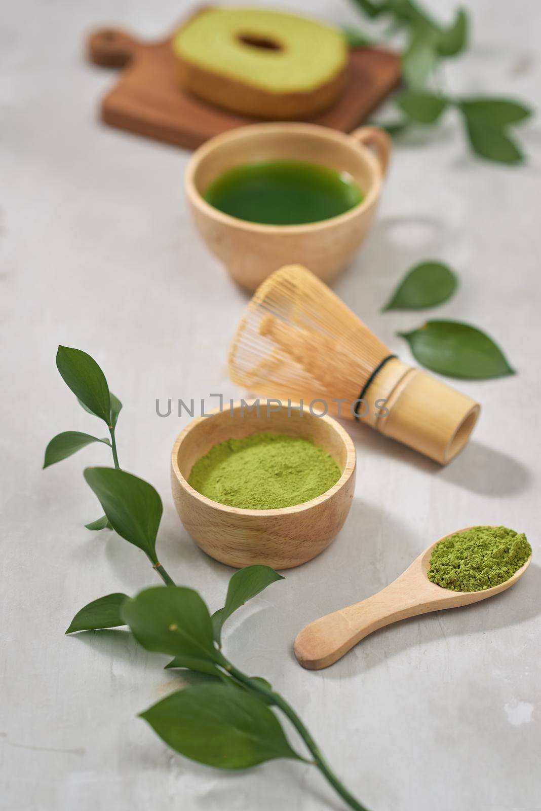 Green matcha Baumkuchen Japanese roll cakes with matcha, selective focus by makidotvn