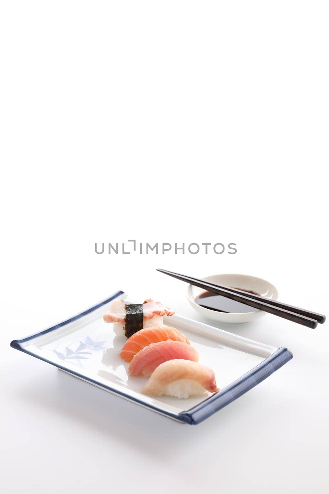 Sushi mix Japanese food sushi salmon tuna octopus eel and sea bass japan local food isolated in white background by piyato