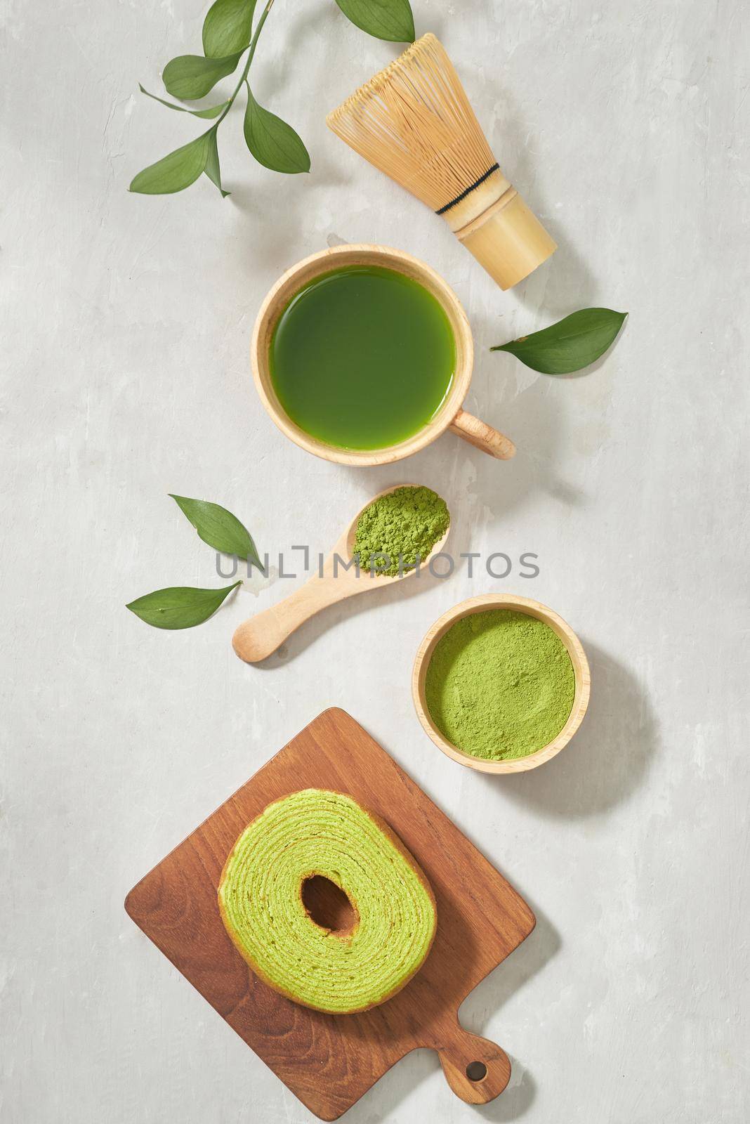 Green matcha Baumkuchen Japanese roll cakes with matcha, selective focus