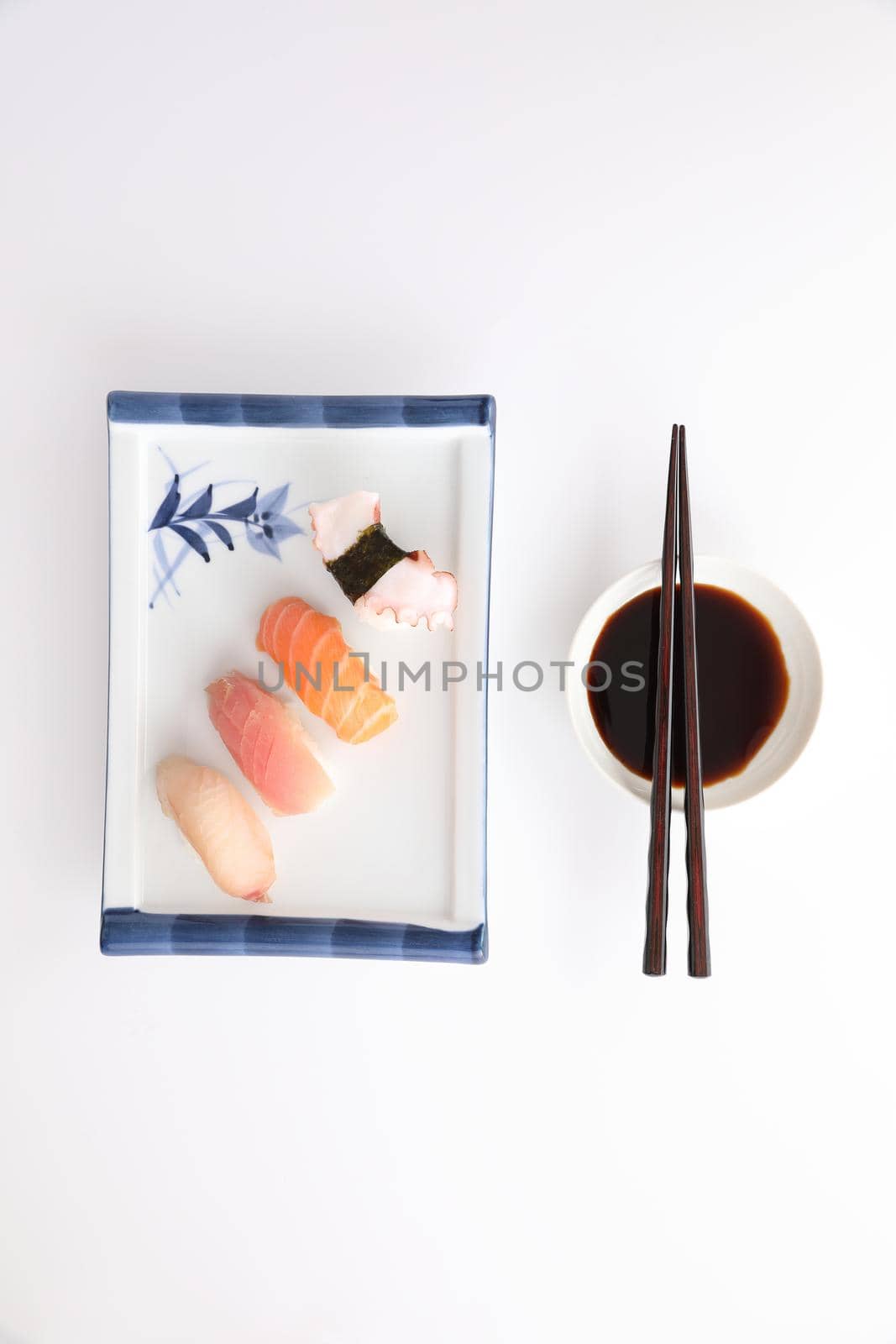 Sushi mix Japanese food sushi salmon tuna octopus eel and sea bass japan local food isolated in white background by piyato