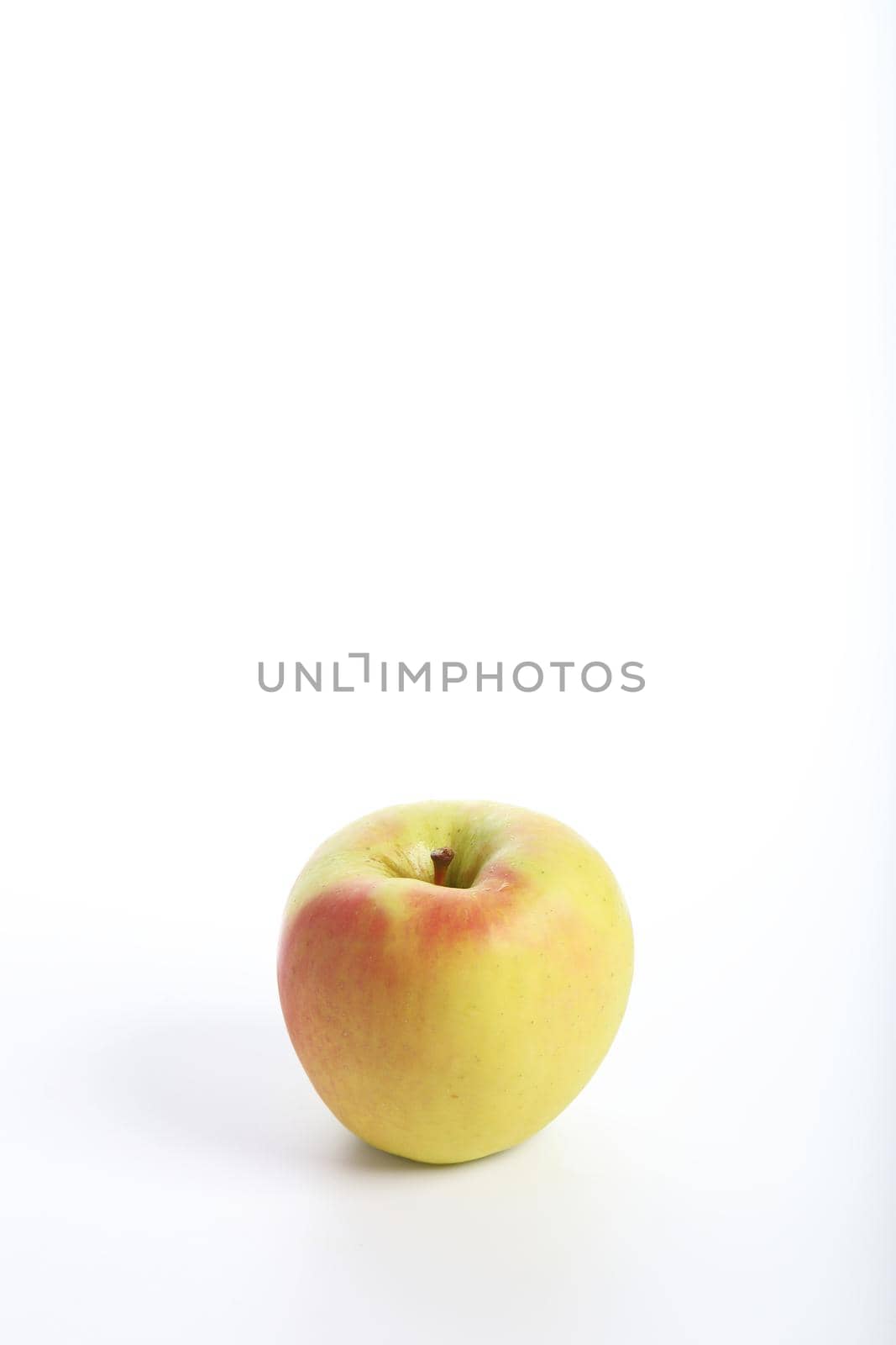 Red yellow apple isolated in white background