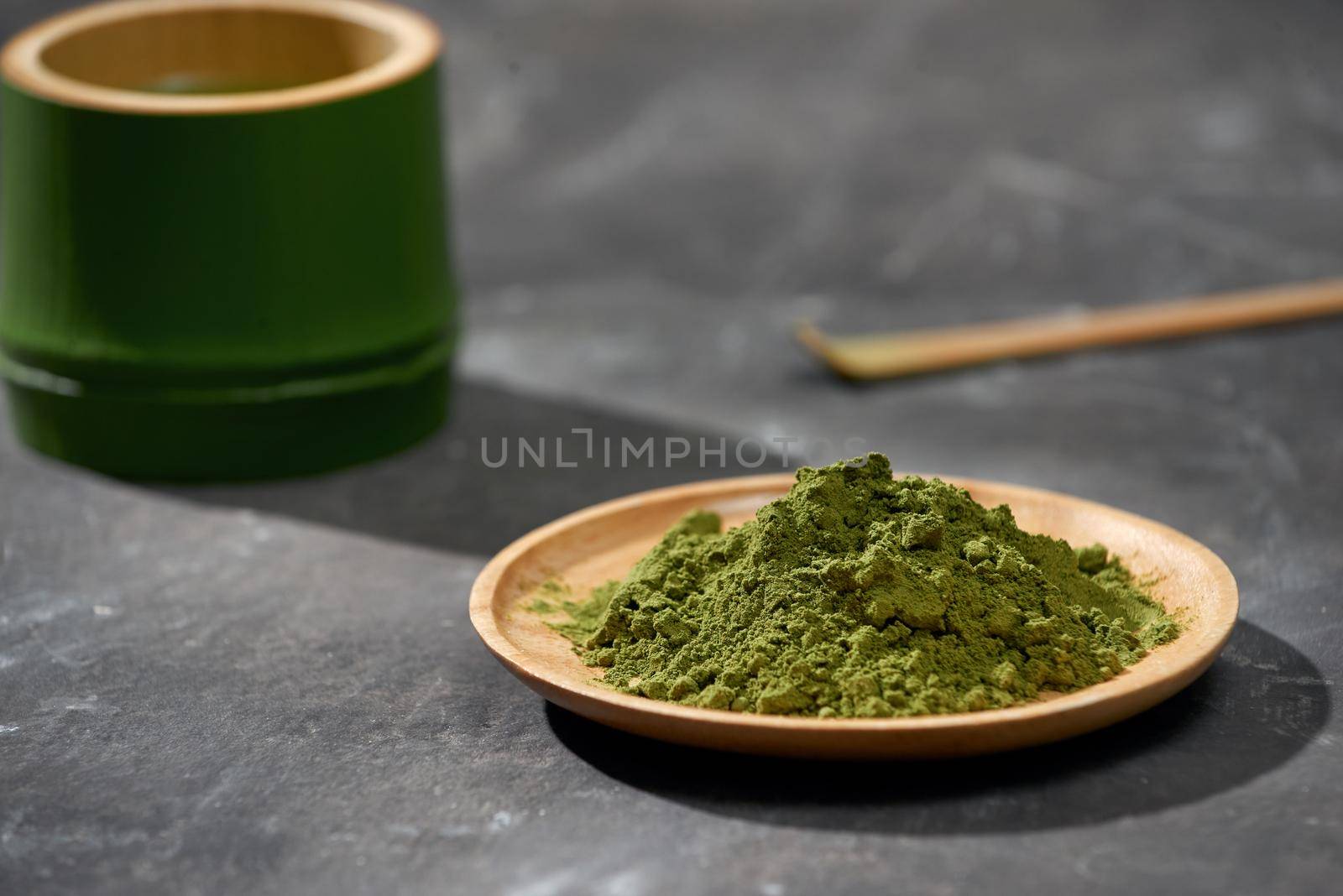 Organic Green Matcha Tea on wooden table, copyspace