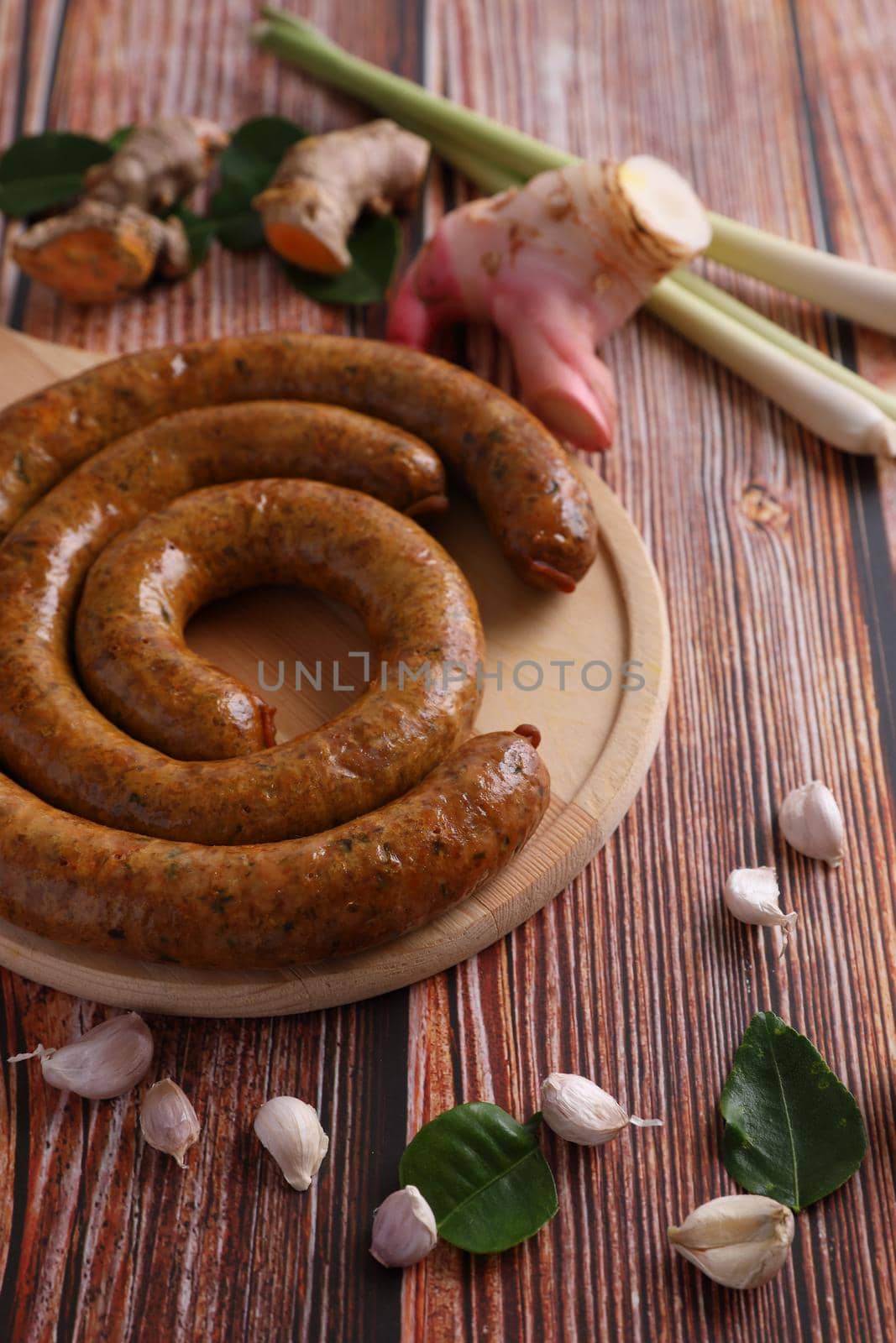 Local Northern Thai food , Northern Thai spicy sausage street food isolated in white background by piyato