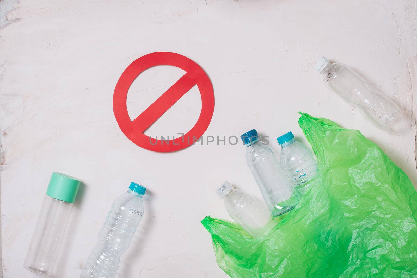 No plastic recycle concept, plastic bottles stack to recycle on white background by makidotvn