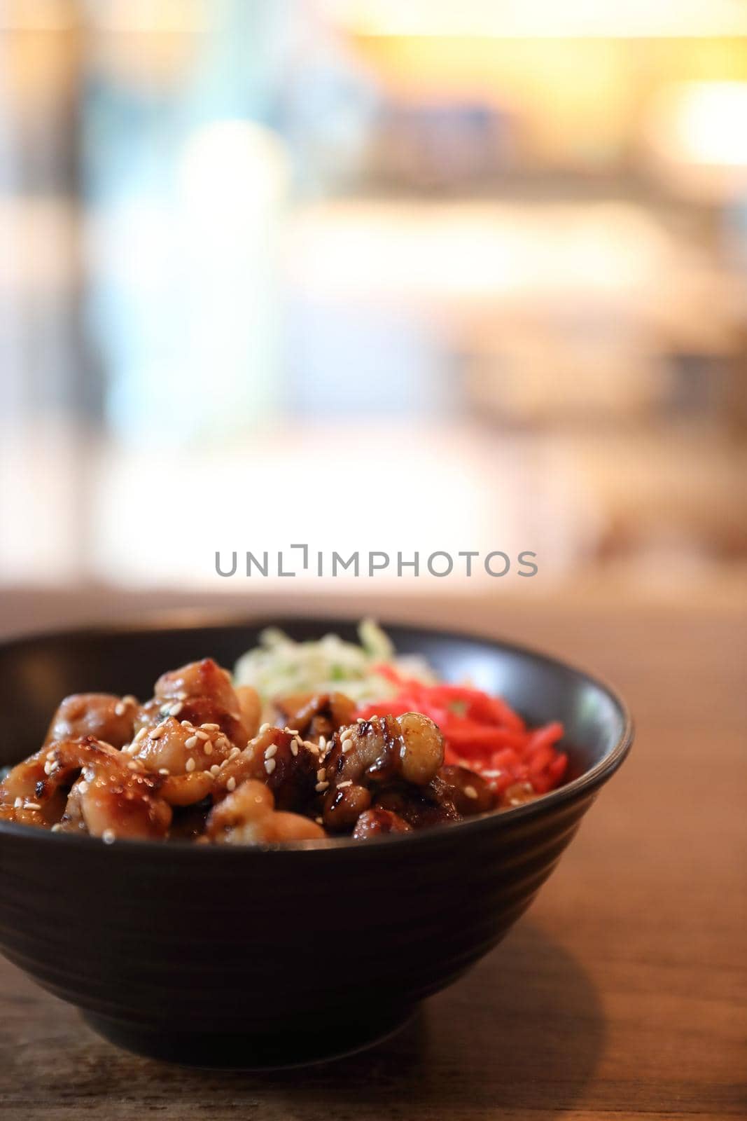 japanese food Chicken teriyaki with rice on wood background by piyato