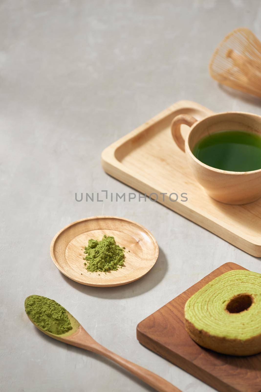 Green matcha Baumkuchen Japanese roll cakes with matcha, selective focus by makidotvn