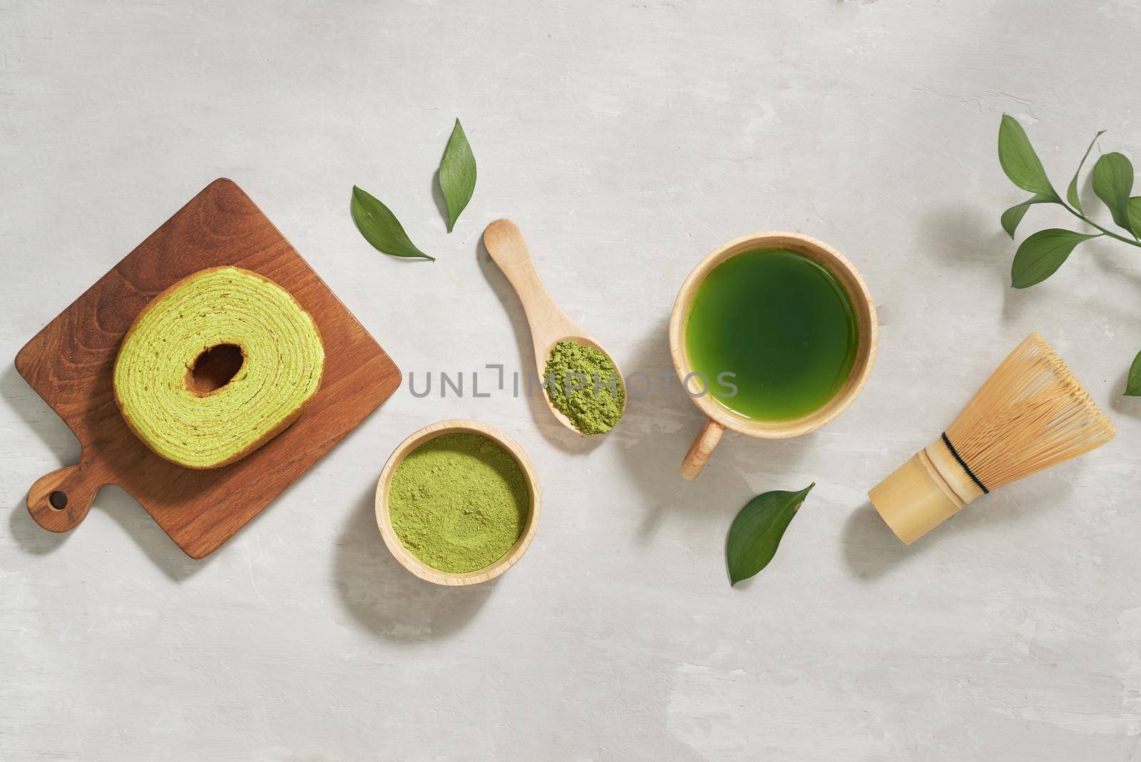 Green matcha Baumkuchen Japanese roll cakes with matcha, selective focus by makidotvn