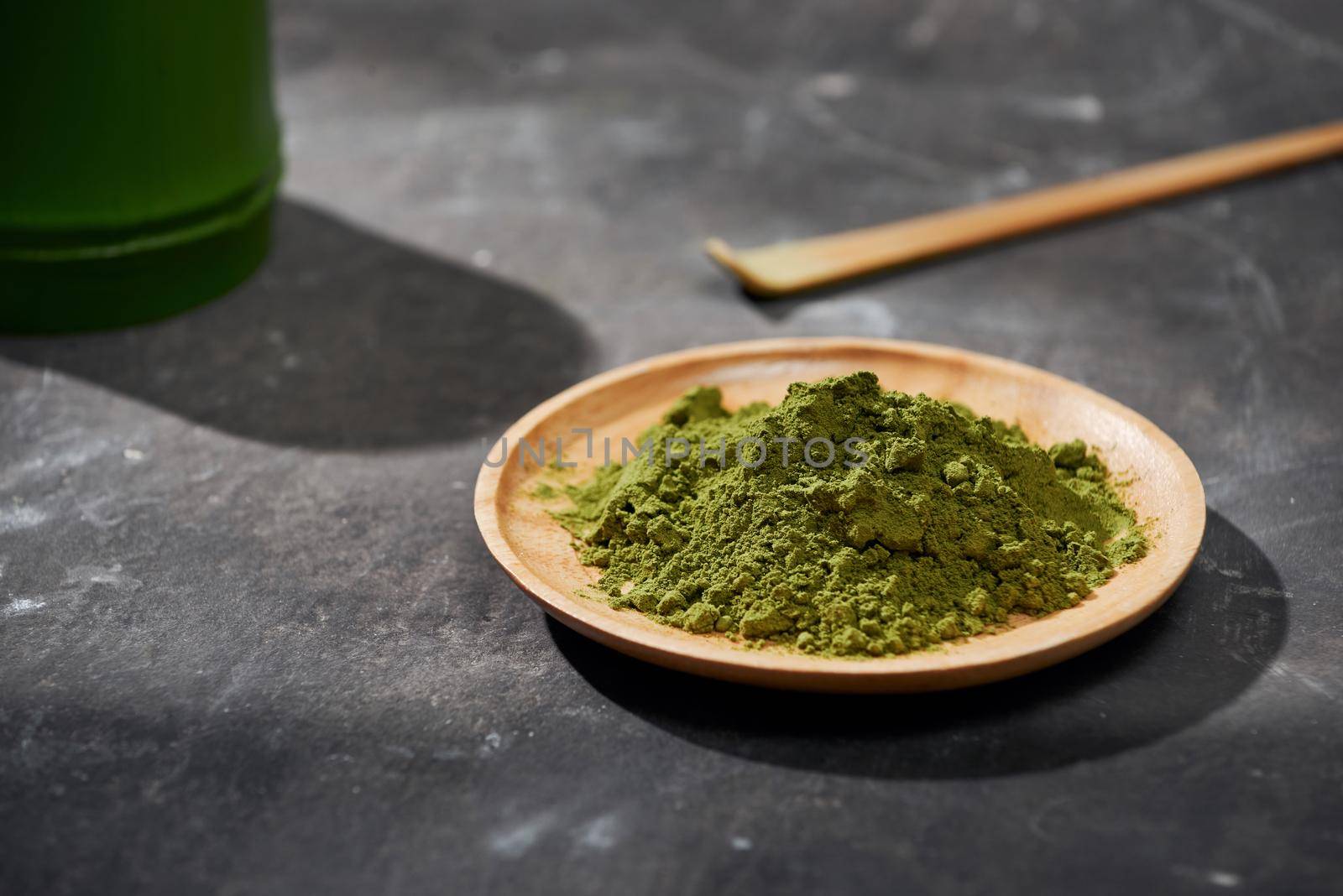 Organic Green Matcha Tea on wooden table, copyspace by makidotvn