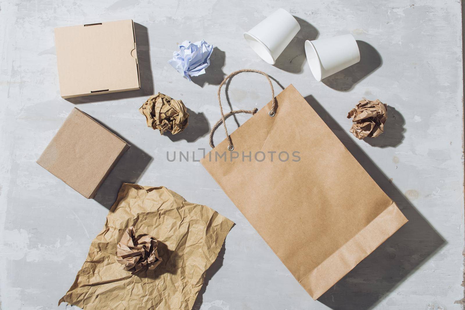 Eco concept with recycling symbol on table background top view