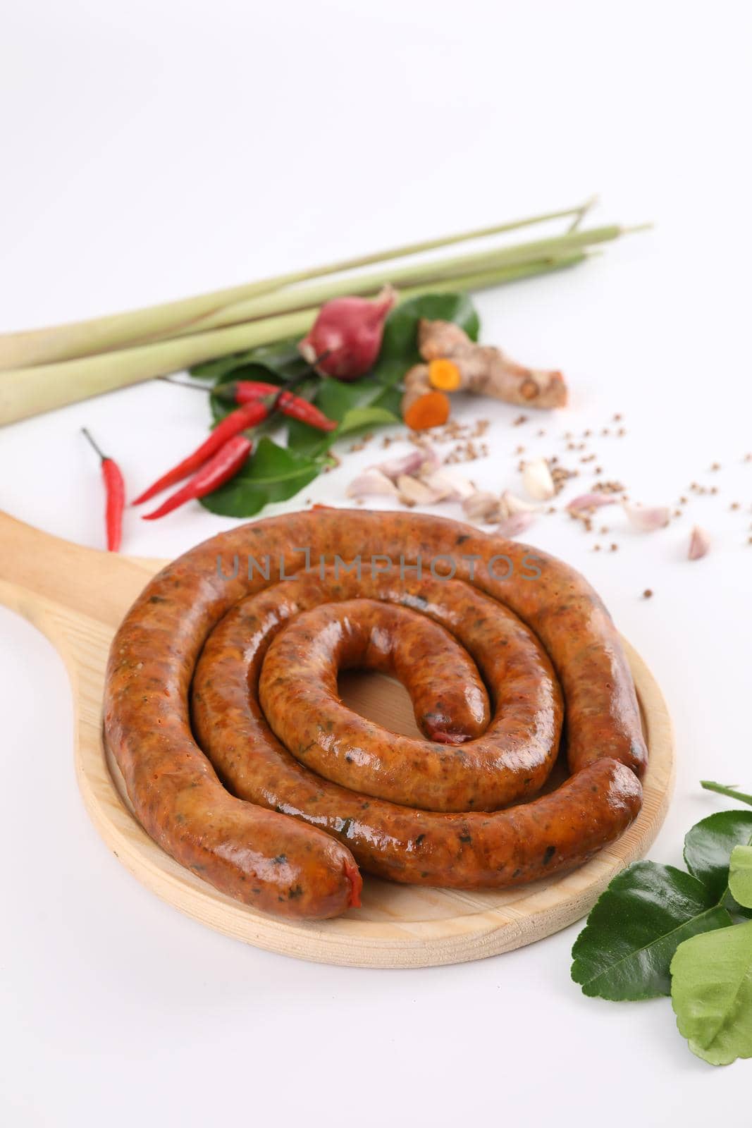 Local Northern Thai food , Northern Thai spicy sausage street food isolated in white background by piyato