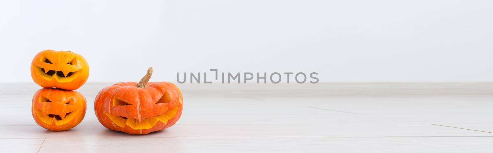 Halloween pumpkin head jack lantern with scary evil faces spooky holiday.