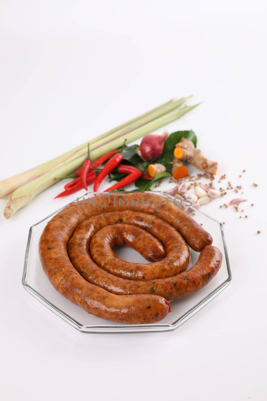 Local Northern Thai food , Northern Thai spicy sausage street food isolated in white background by piyato