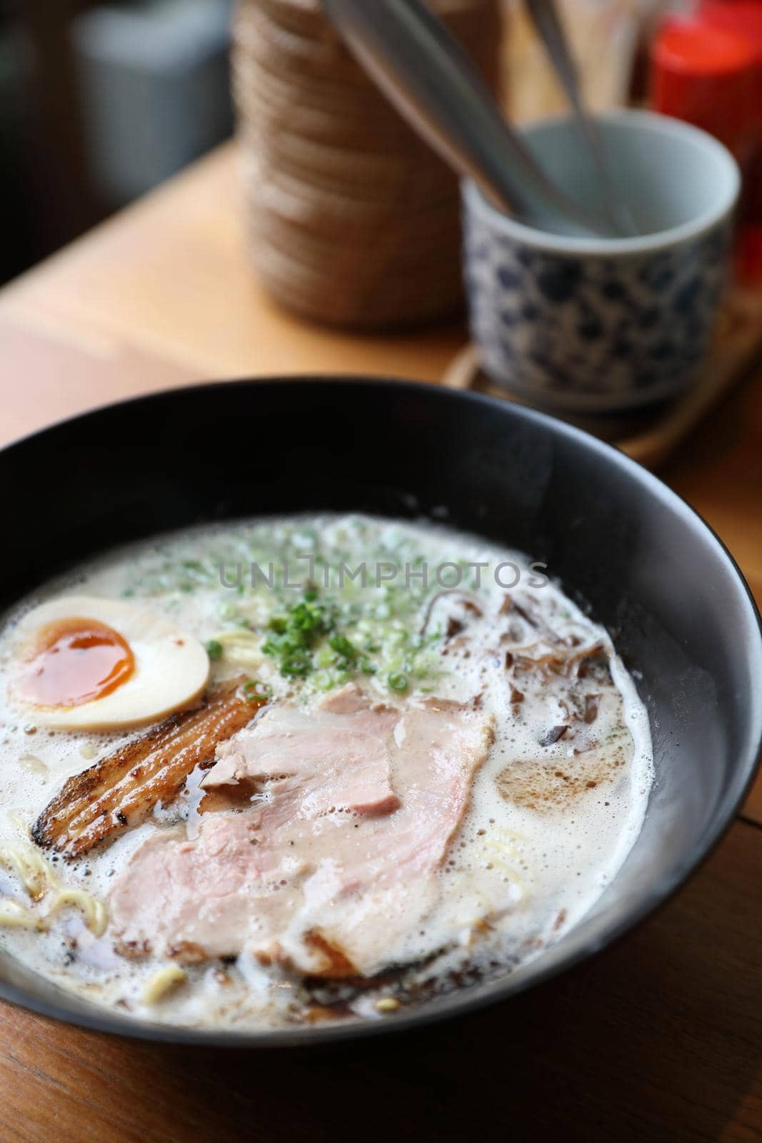 Ramen noodle with pork and egg on soup Japanese food by piyato