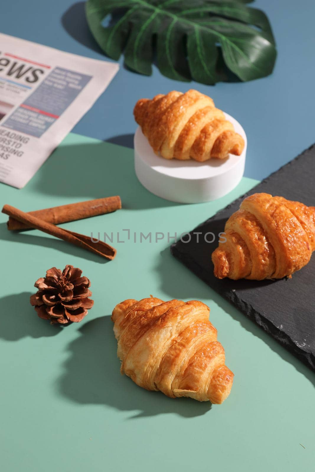 Croissant isolated in sunny light  by piyato