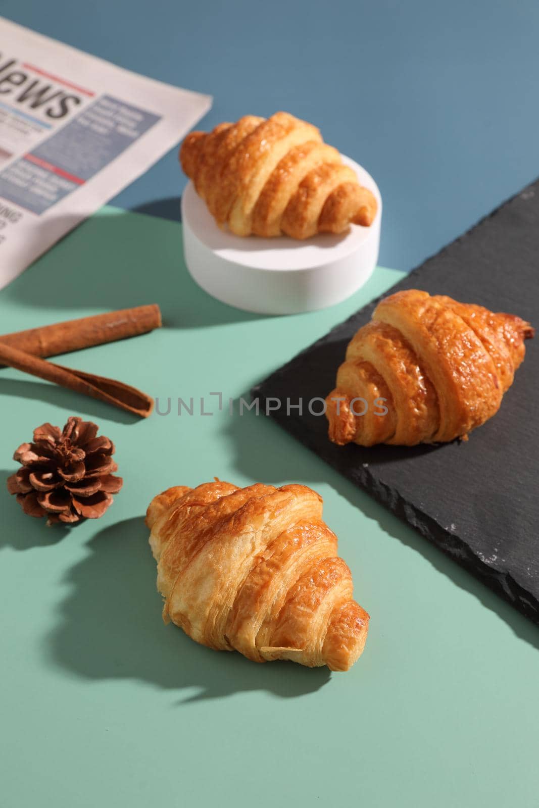 Croissant isolated in sunny light  by piyato